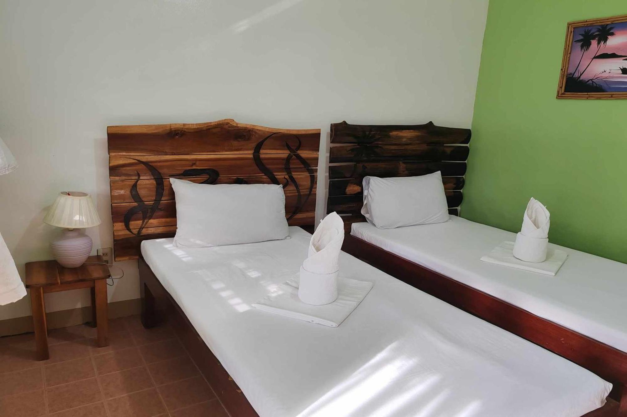 Barton Summer Homes Beach Resort And Cottages Palawan מראה חיצוני תמונה
